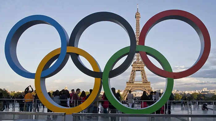 FILE - The Olympic rings are set up at Trocadero plaza that overlooks the Eiffel Tower in Paris on Sept. 14, 2017. Track and field athletes from Brazil, Ecuador, Peru and Portugal will be tested more often ahead of this year's Paris Olympics because of sub-standard anti-doping programs at home, the sport’s investigators said Monday March 11, 2024. (AP Photo/Michel Euler, File)